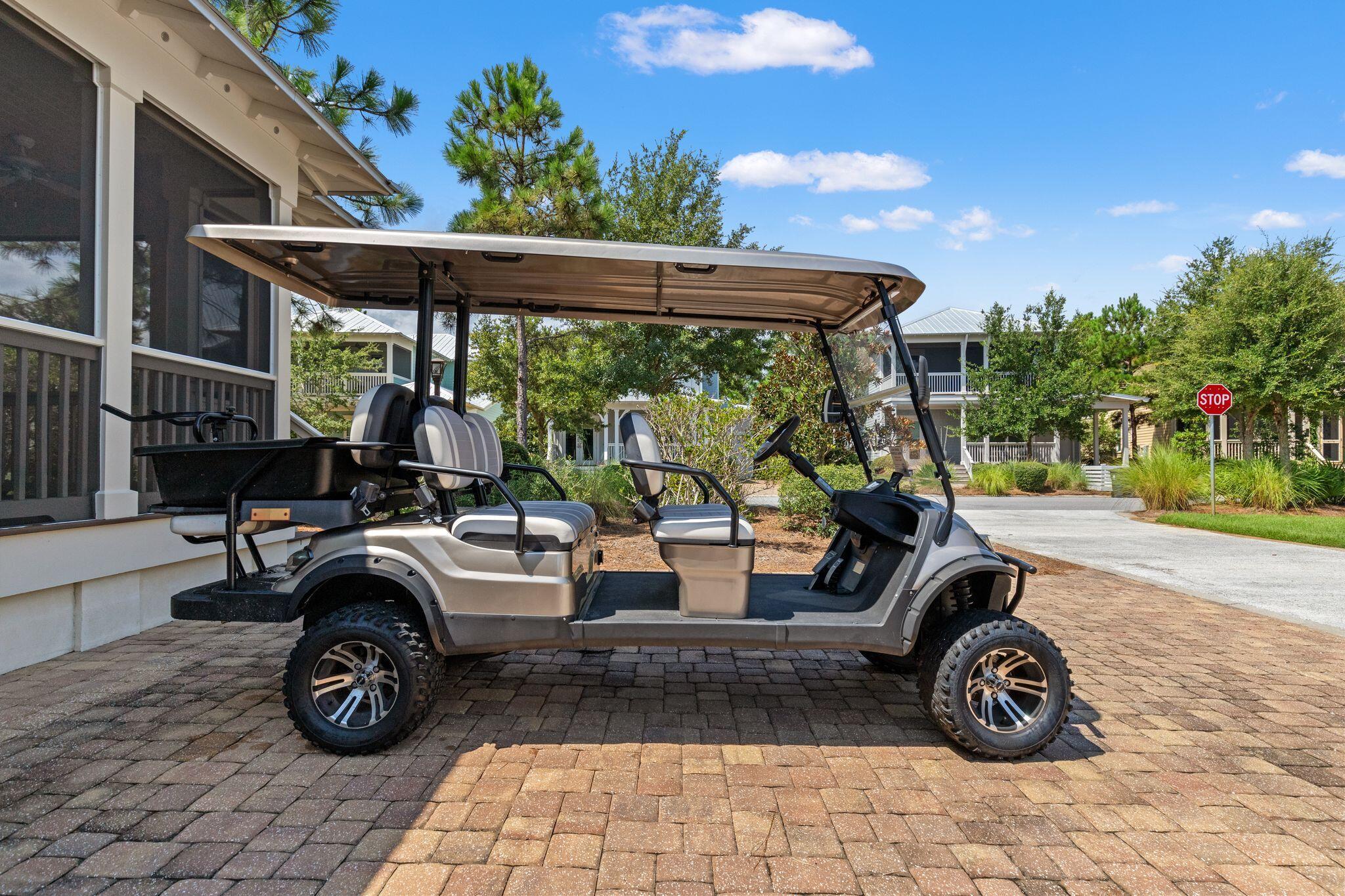 694 Flatwoods Forest Loop Santa Rosa Beach, FL 32459 - Photo 37 of 54 a view of backyard with trampoline