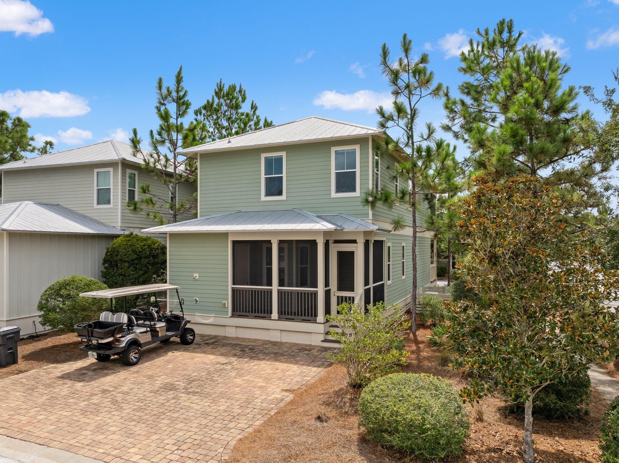 694 Flatwoods Forest Loop Santa Rosa Beach, FL 32459 - Photo 46 of 54 a view of a house with patio