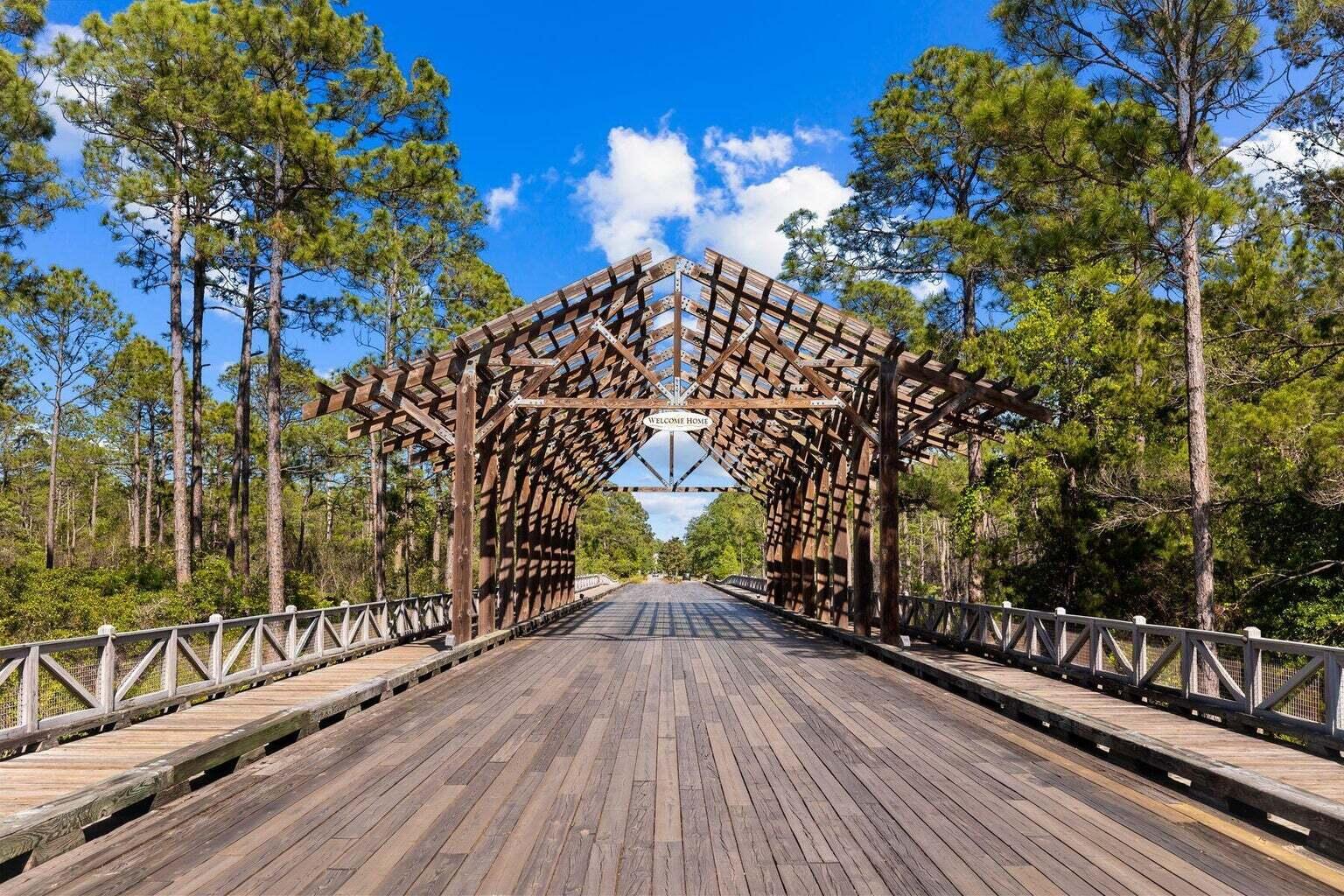 694 Flatwoods Forest Loop Santa Rosa Beach, FL 32459 - Photo 49 of 54 a view of balcony with wooden floor