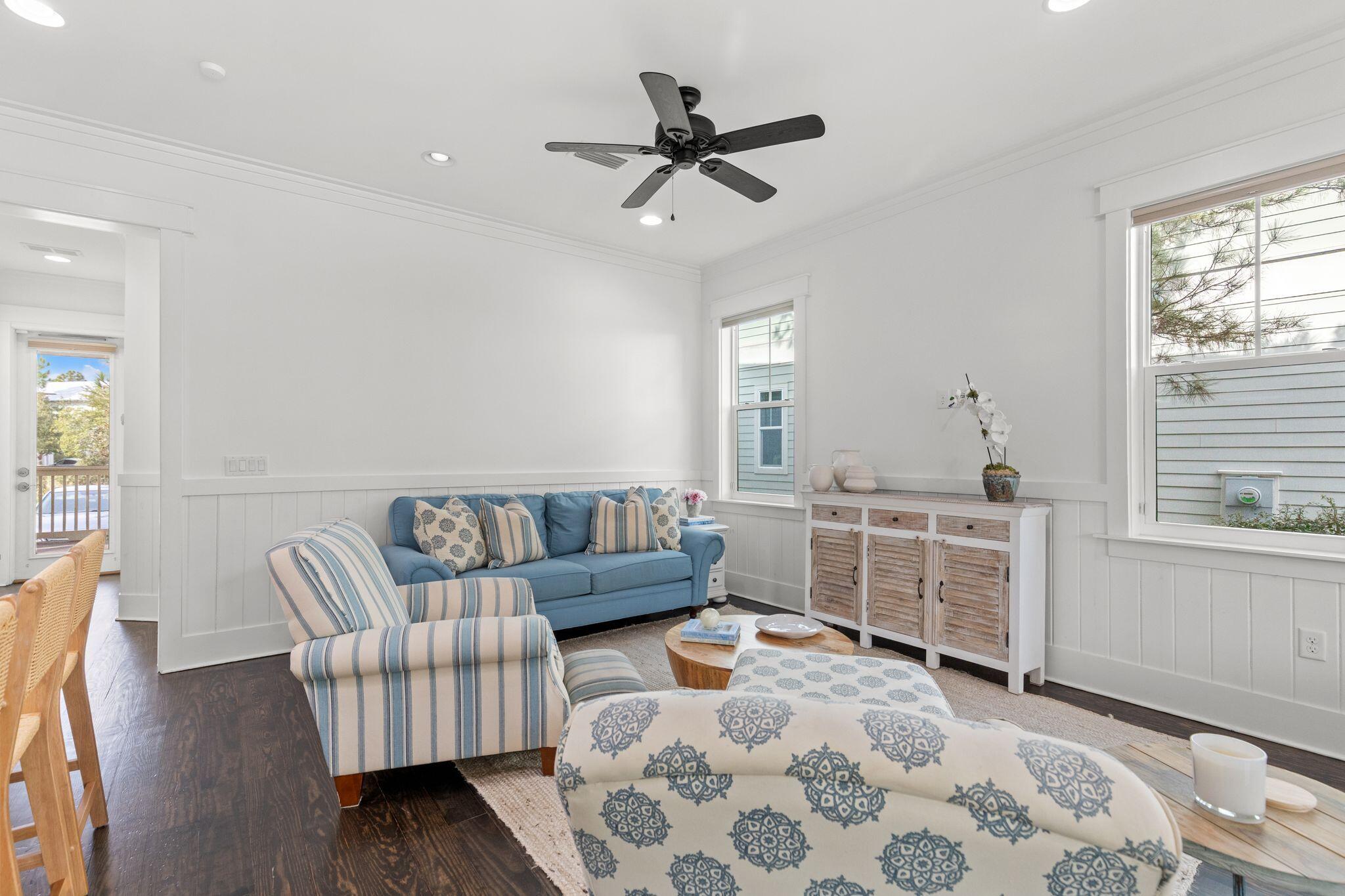 694 Flatwoods Forest Loop Santa Rosa Beach, FL 32459 - Photo 6 of 54 a living room with furniture and windows