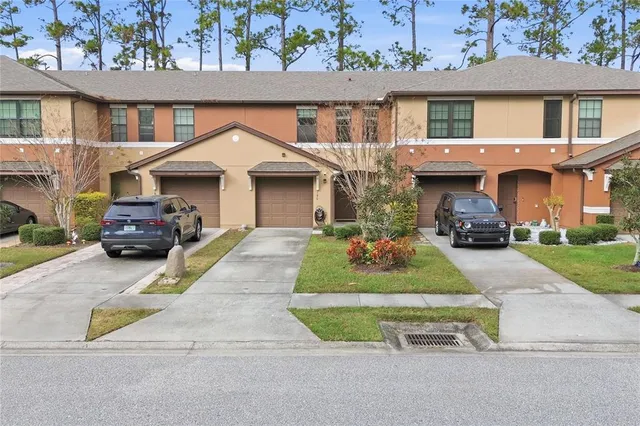 an aerial view of a city with lots of residential buildings