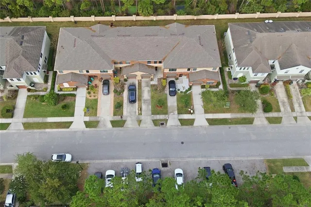 a view of a street with cars