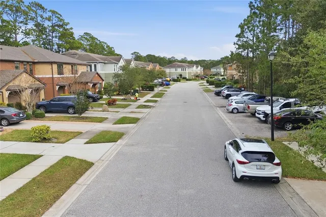a view of a city with lawn chairs