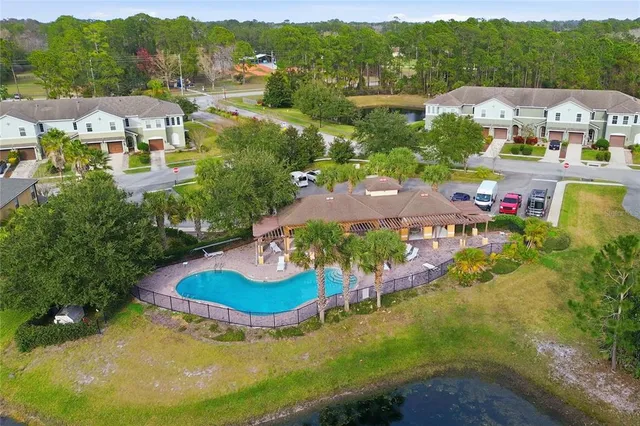 a view of a golf course with a lake