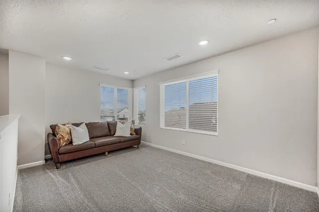 a view of a livingroom with wooden floor