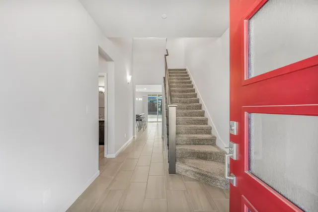 a view of a hallway with staircase