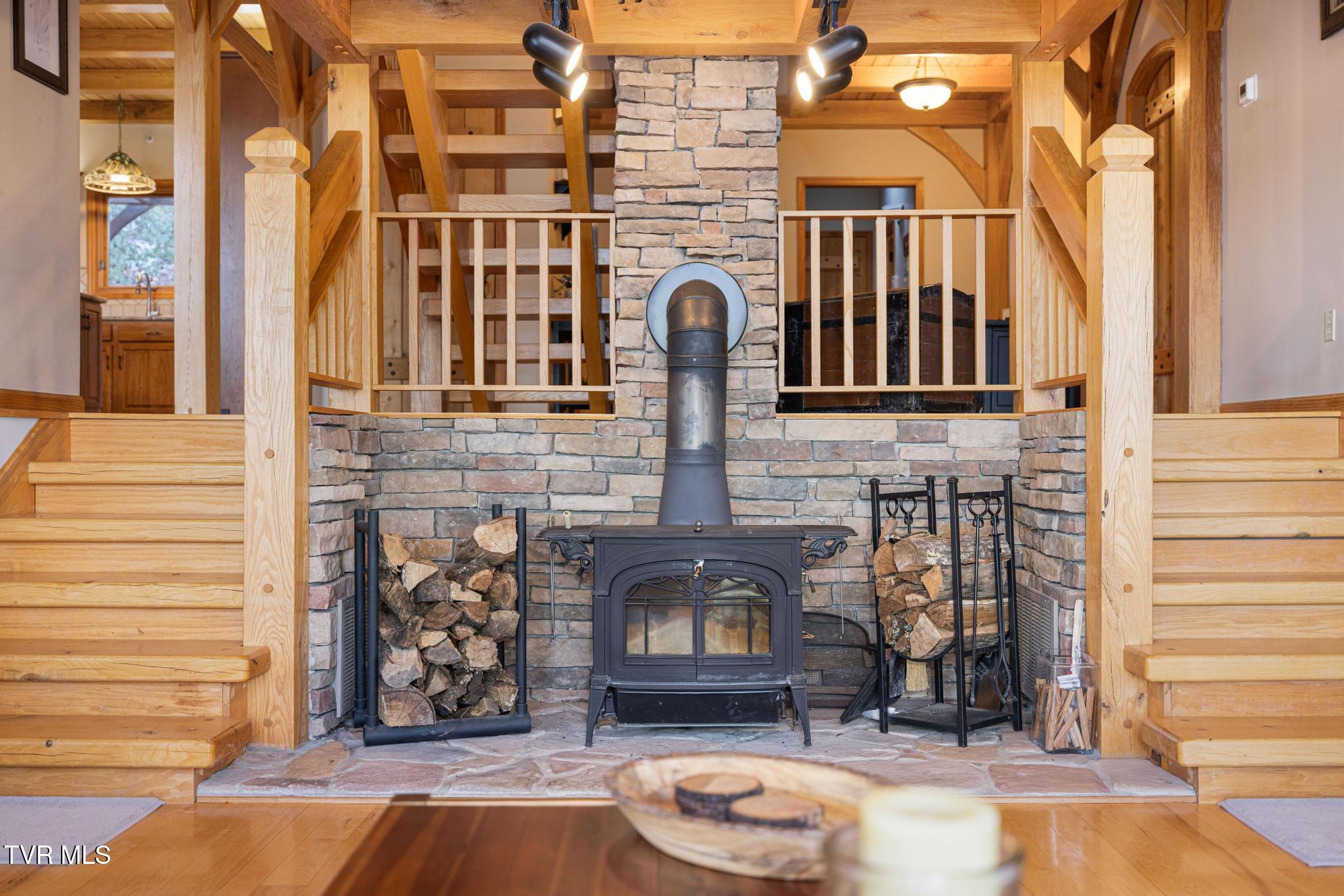 435 Cherokee Mountain Road Jonesborough, TN 37659 - Photo 23 of 75 Wood burning stove in living room