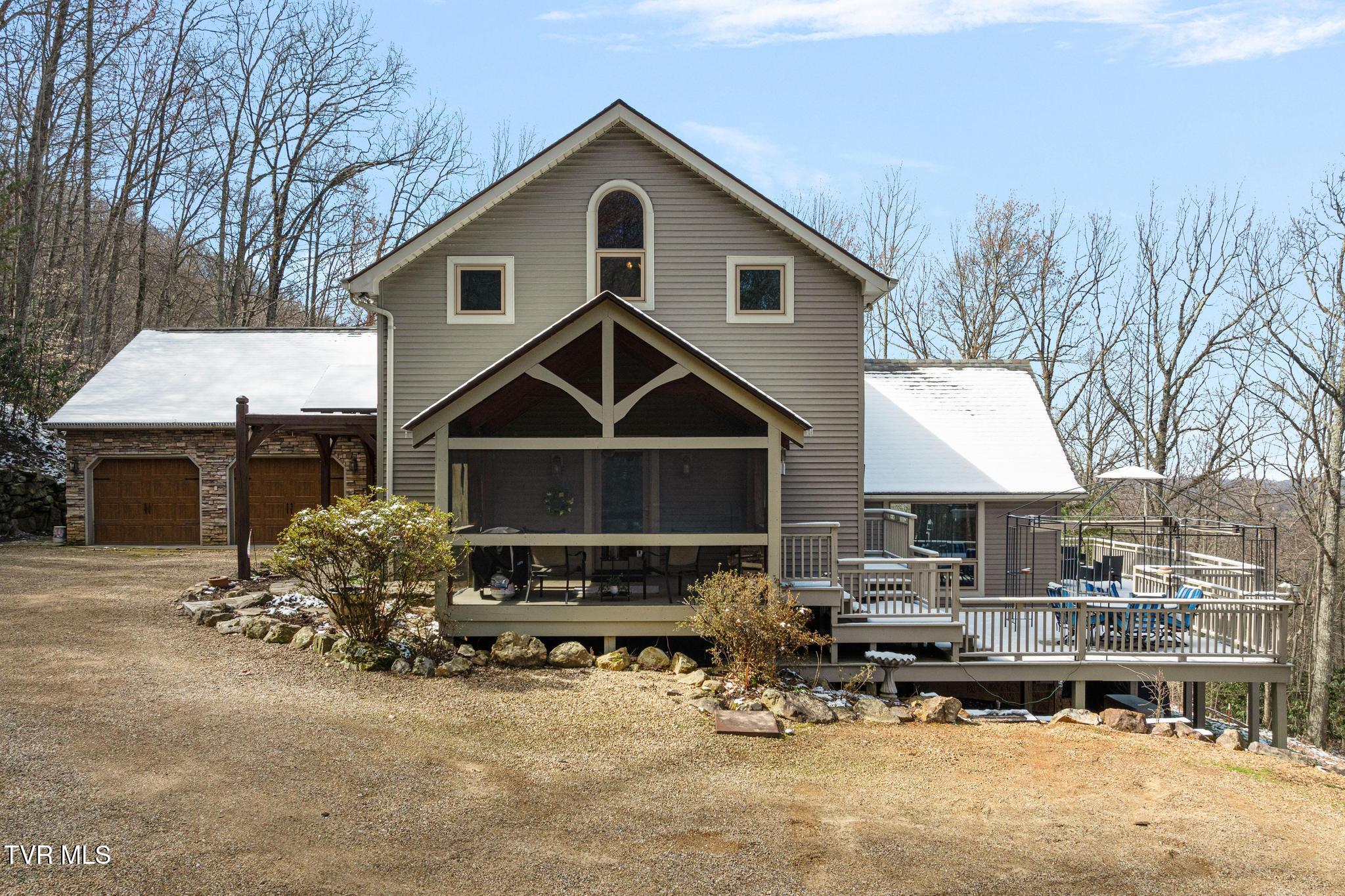 435 Cherokee Mountain Road Jonesborough, TN 37659 - Photo 6 of 75 Side view with screened in porch