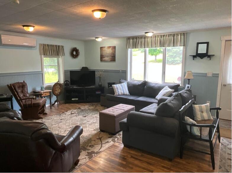 27 Reach Road Presque Isle, ME 04769 - Photo 67 of 82 Attached executive apartment living room