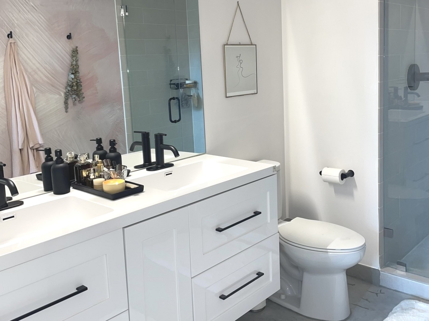 320 East 21st Street, Unit 215 Chicago, IL 60616 - Photo 11 of 18 a bathroom with a sink toilet and shower