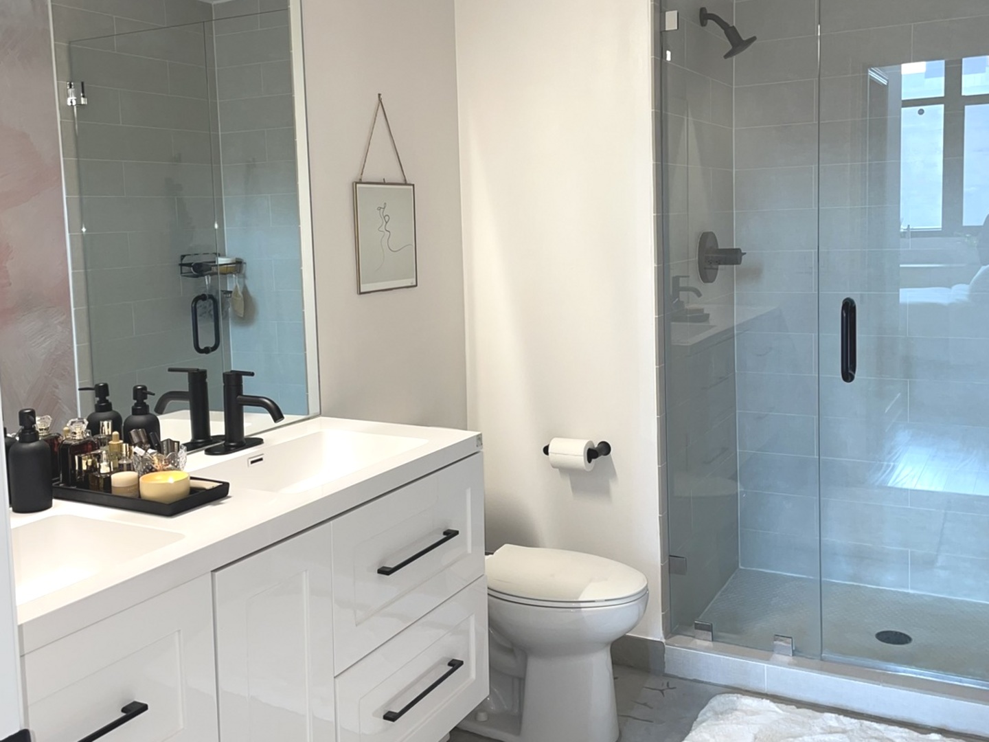 320 East 21st Street, Unit 215 Chicago, IL 60616 - Photo 12 of 18 a bathroom with a sink a toilet and shower