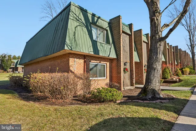 a bathroom with a sink mirror and vanity