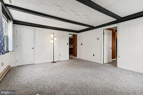 a kitchen with stainless steel appliances granite countertop a refrigerator stove and sink
