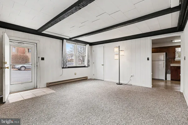 an empty room with windows