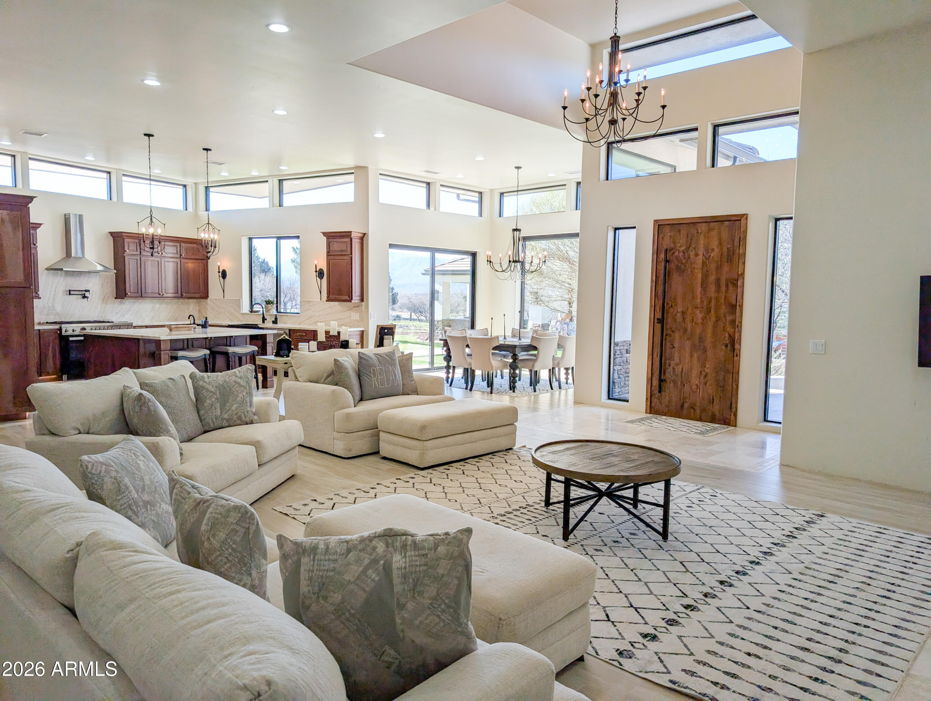 2833 South Old Church Road Camp Verde, AZ 86322 - Photo 11 of 116 a living room with furniture and a chandelier