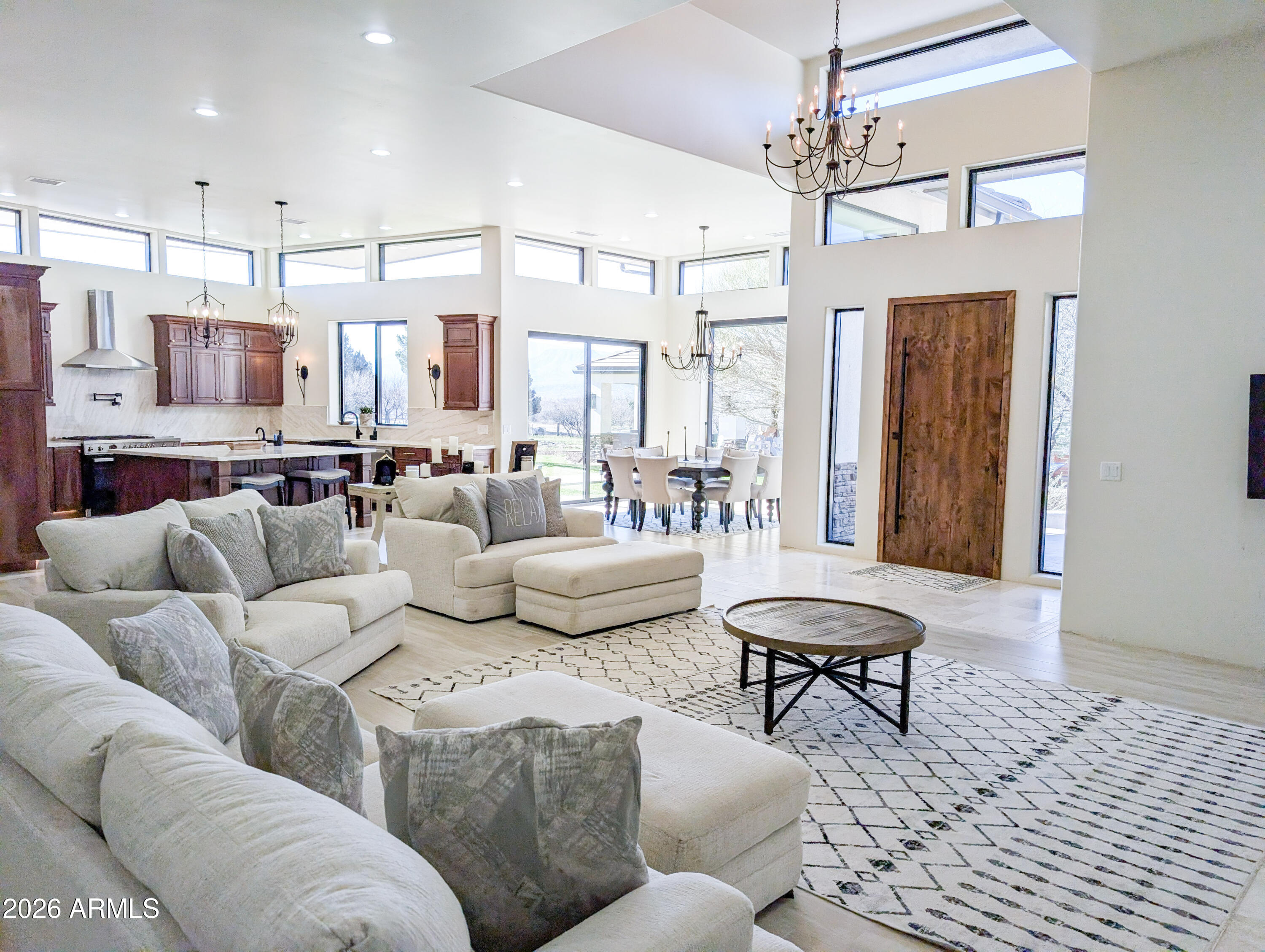 2833 South Old Church Road Camp Verde, AZ 86322 - Photo 47 of 116 a living room with furniture and a chandelier