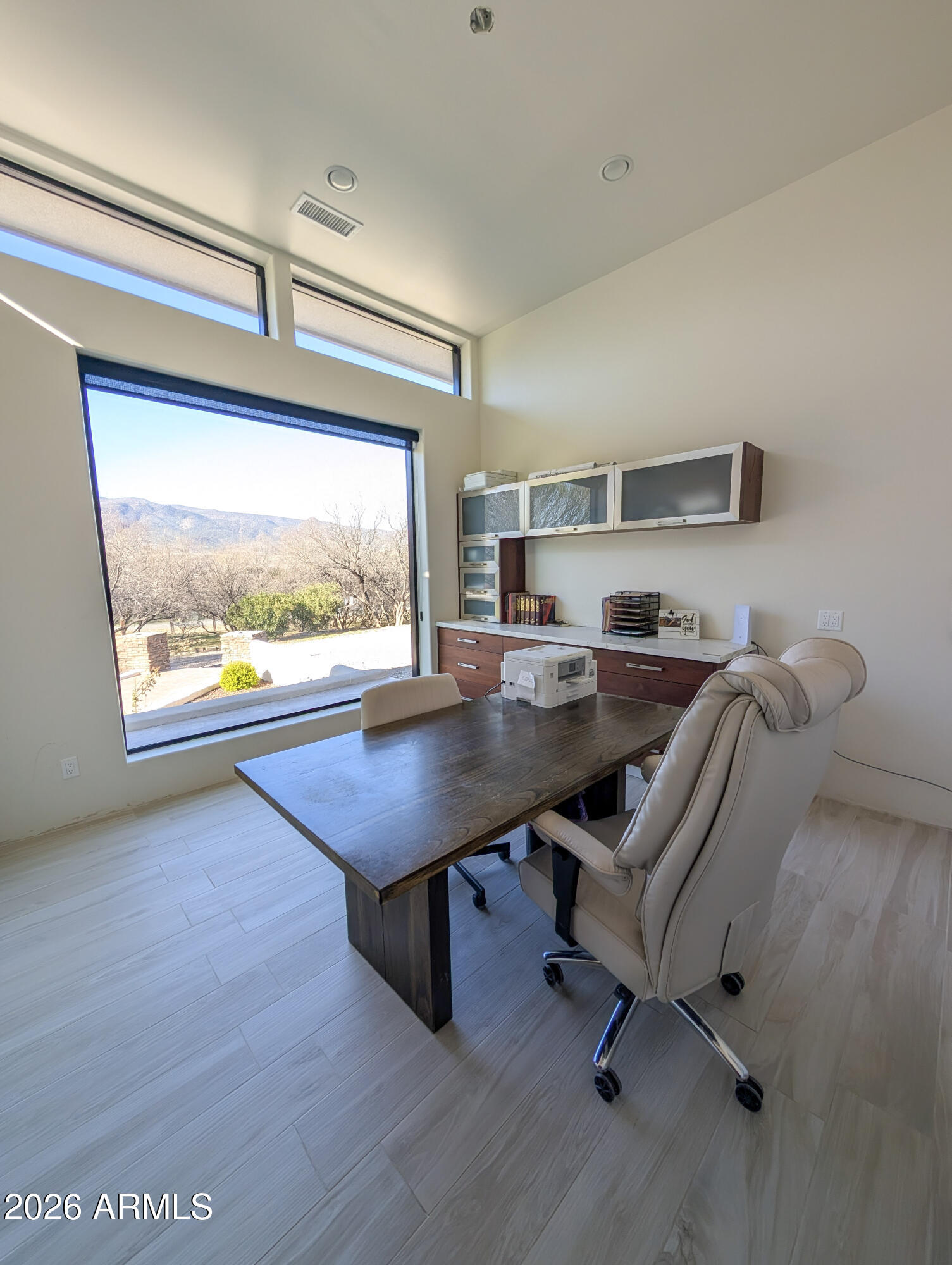 2833 South Old Church Road Camp Verde, AZ 86322 - Photo 62 of 116 a view of a workspace with furniture and a window