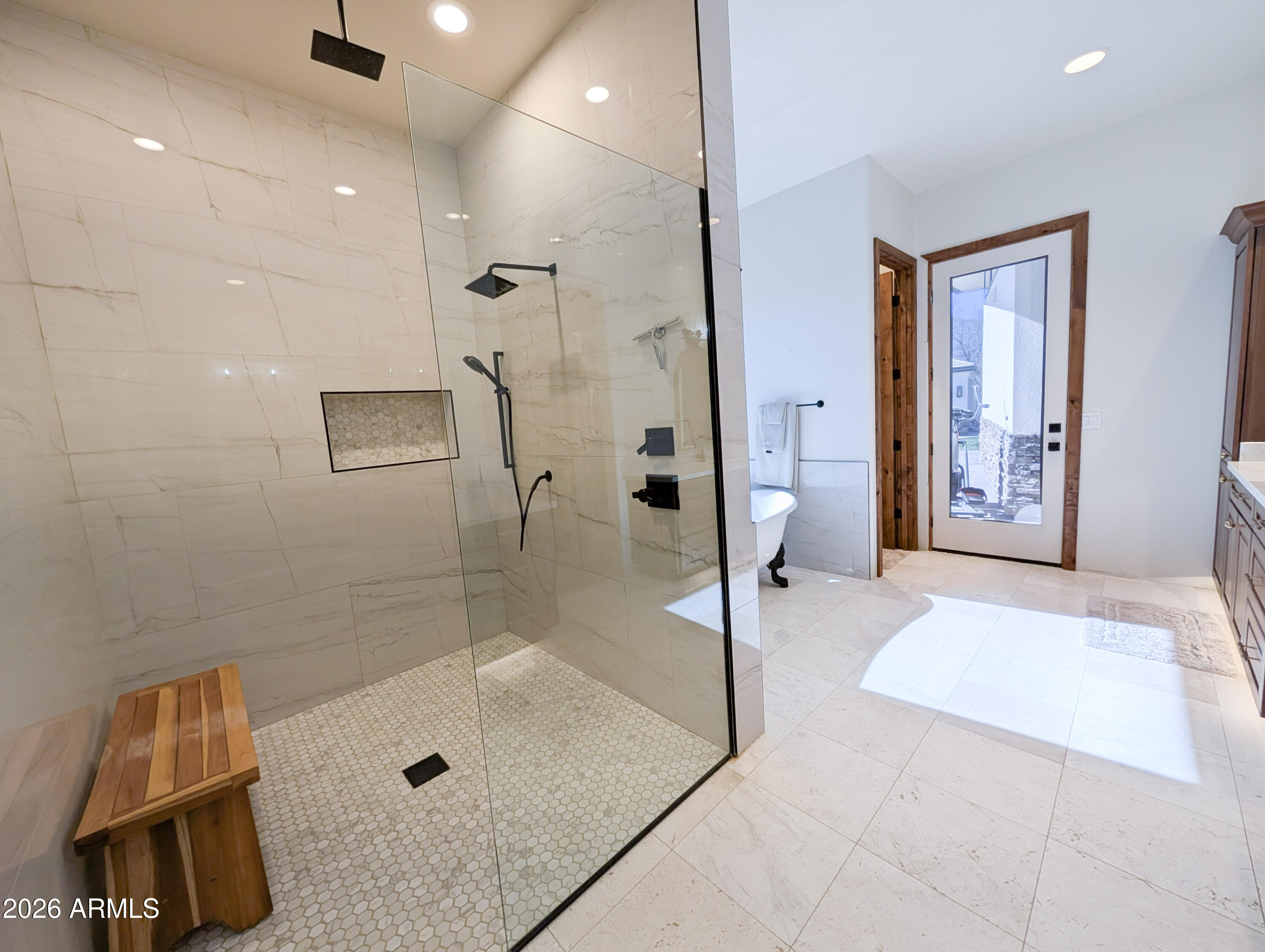 2833 South Old Church Road Camp Verde, AZ 86322 - Photo 68 of 116 a spacious bathroom with a tub shower and mirror