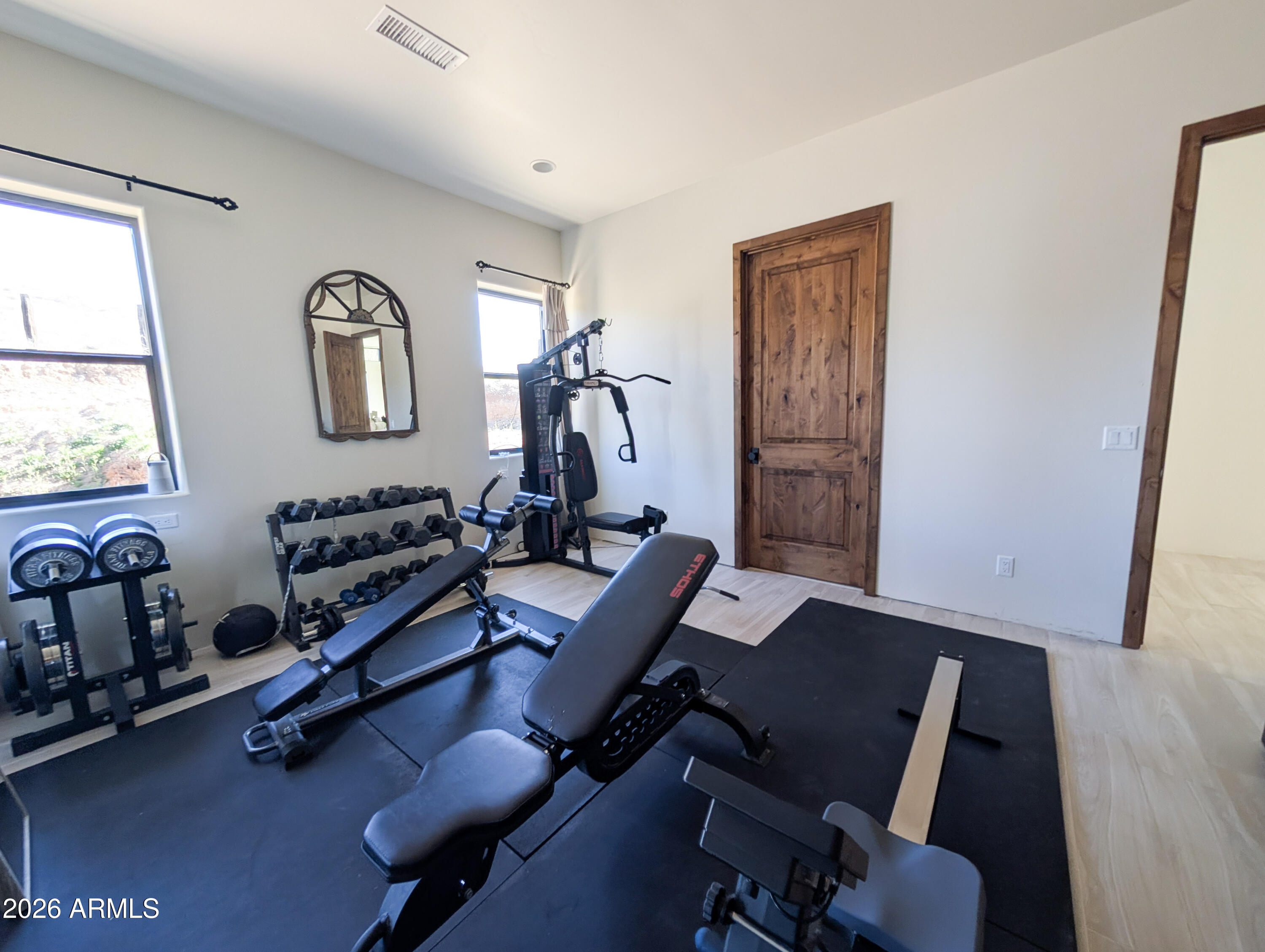 2833 South Old Church Road Camp Verde, AZ 86322 - Photo 78 of 116 a view of a workspace with furniture and a window