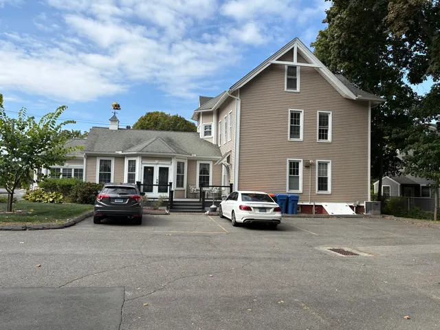a car parked in front of a house