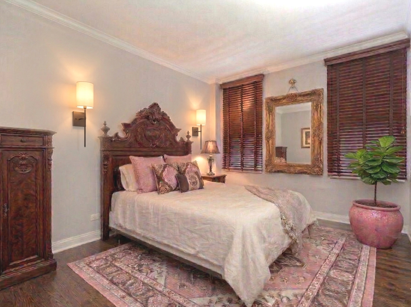 6334 North Sheridan Road, Unit 3E Chicago, IL 60660 - Photo 32 of 39 a bedroom with a bed and a potted plant