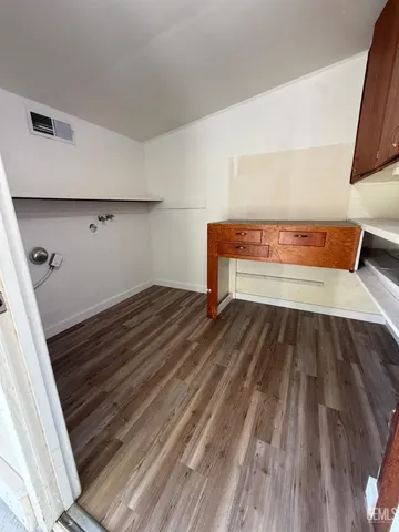 a room with storage and utility