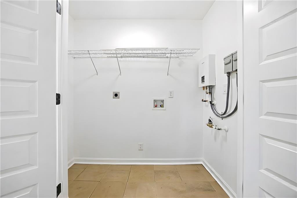 1775 Hadlock Street Southwest Atlanta, GA 30311 - Photo 13 of 27 a bathroom with a shower