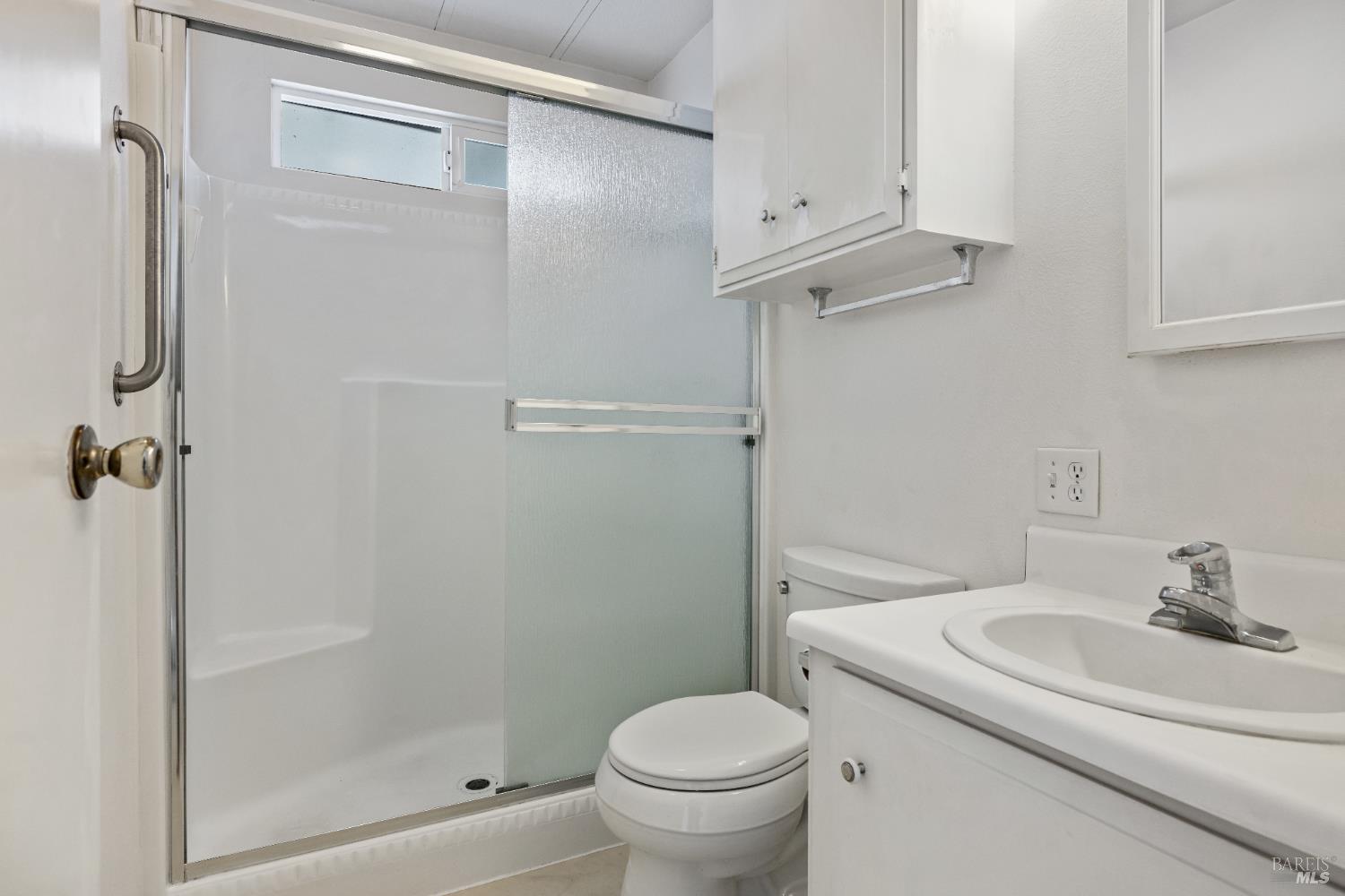 58 Círculo Puerto Rohnert Park, CA 94928 - Photo 17 of 30 a bathroom with a granite countertop sink toilet and shower