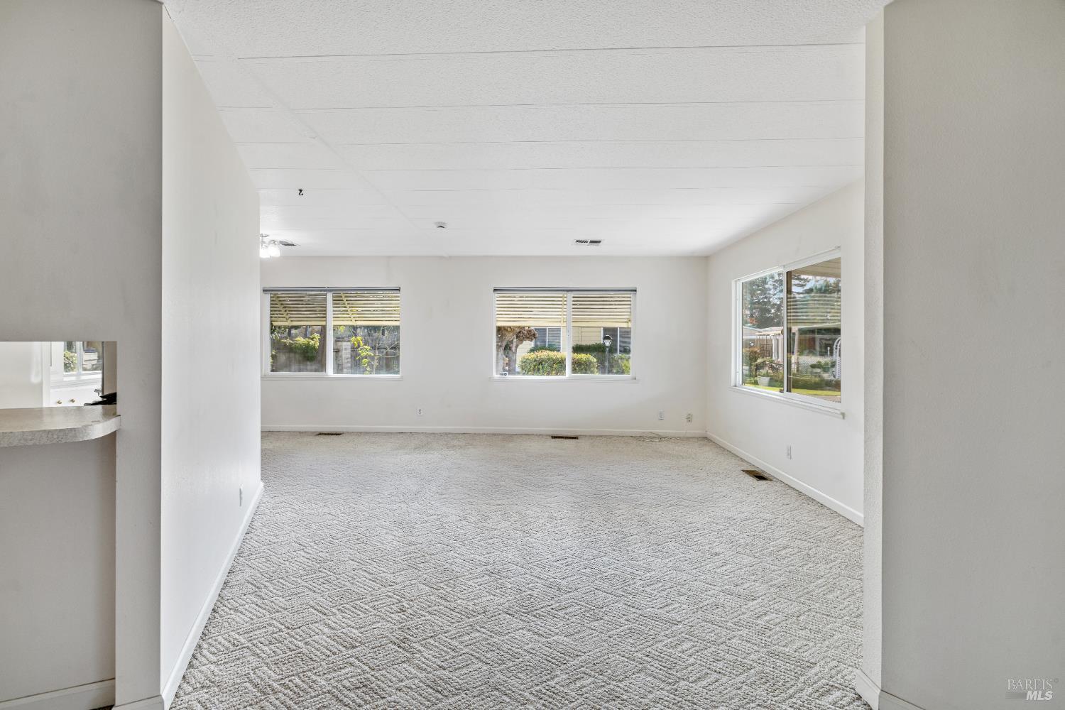 58 Círculo Puerto Rohnert Park, CA 94928 - Photo 6 of 30 an empty room with windows