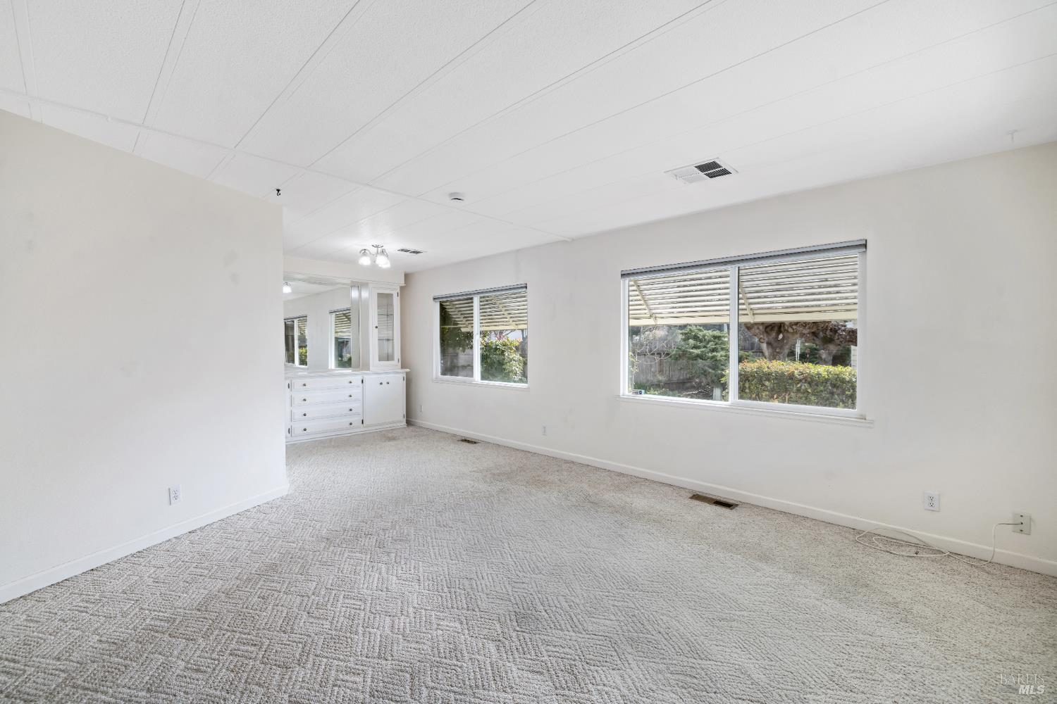 58 Círculo Puerto Rohnert Park, CA 94928 - Photo 8 of 30 an empty room with windows