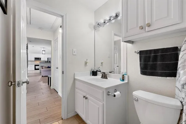 a kitchen with stainless steel appliances granite countertop a stove and a sink