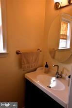 10504 Amherst Avenue Silver Spring, MD 20902 - Photo 17 of 21 a bathroom with a sink and a window
