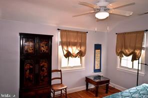 10504 Amherst Avenue Silver Spring, MD 20902 - Photo 18 of 21 a living room with furniture and a window