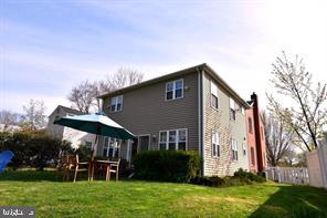 10504 Amherst Avenue Silver Spring, MD 20902 - Photo 21 of 21 a front view of house with yard and seating area