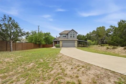 a house with trees in the background