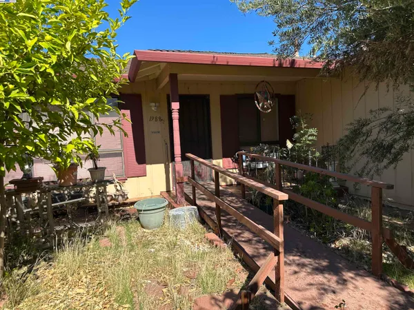 a view of house with patio