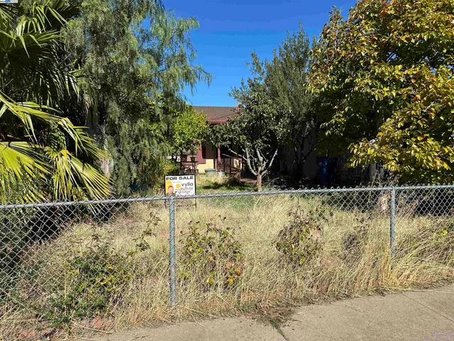 a view of swimming pool with a yard