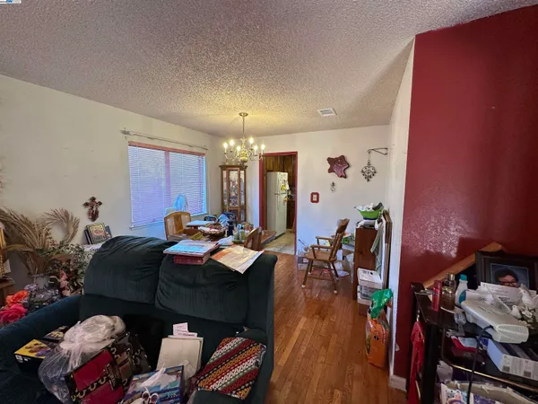 a room with furniture and wooden floor