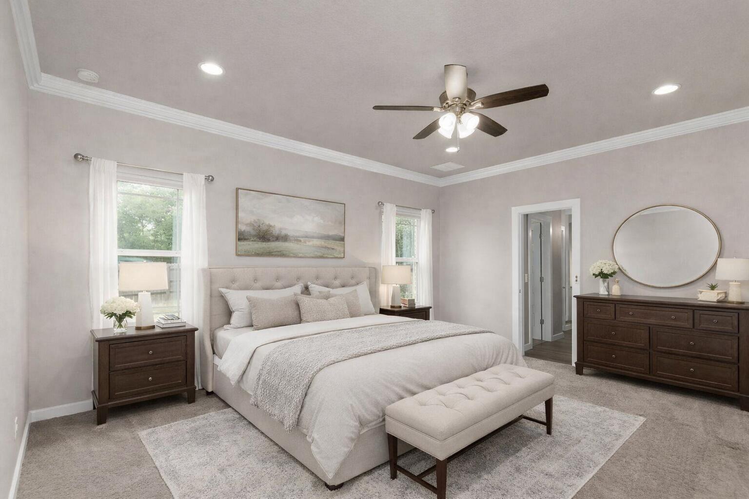 6437 Amanda Court Crestview, FL 32536 - Photo 20 of 48 a bedroom with a bed a chandelier and a dresser