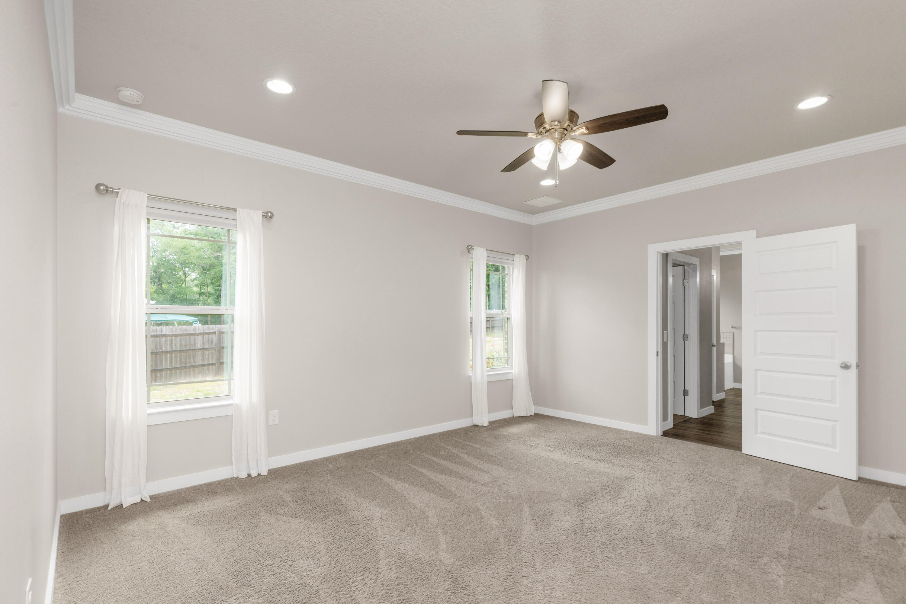 6437 Amanda Court Crestview, FL 32536 - Photo 21 of 48 a view of an empty room with a window