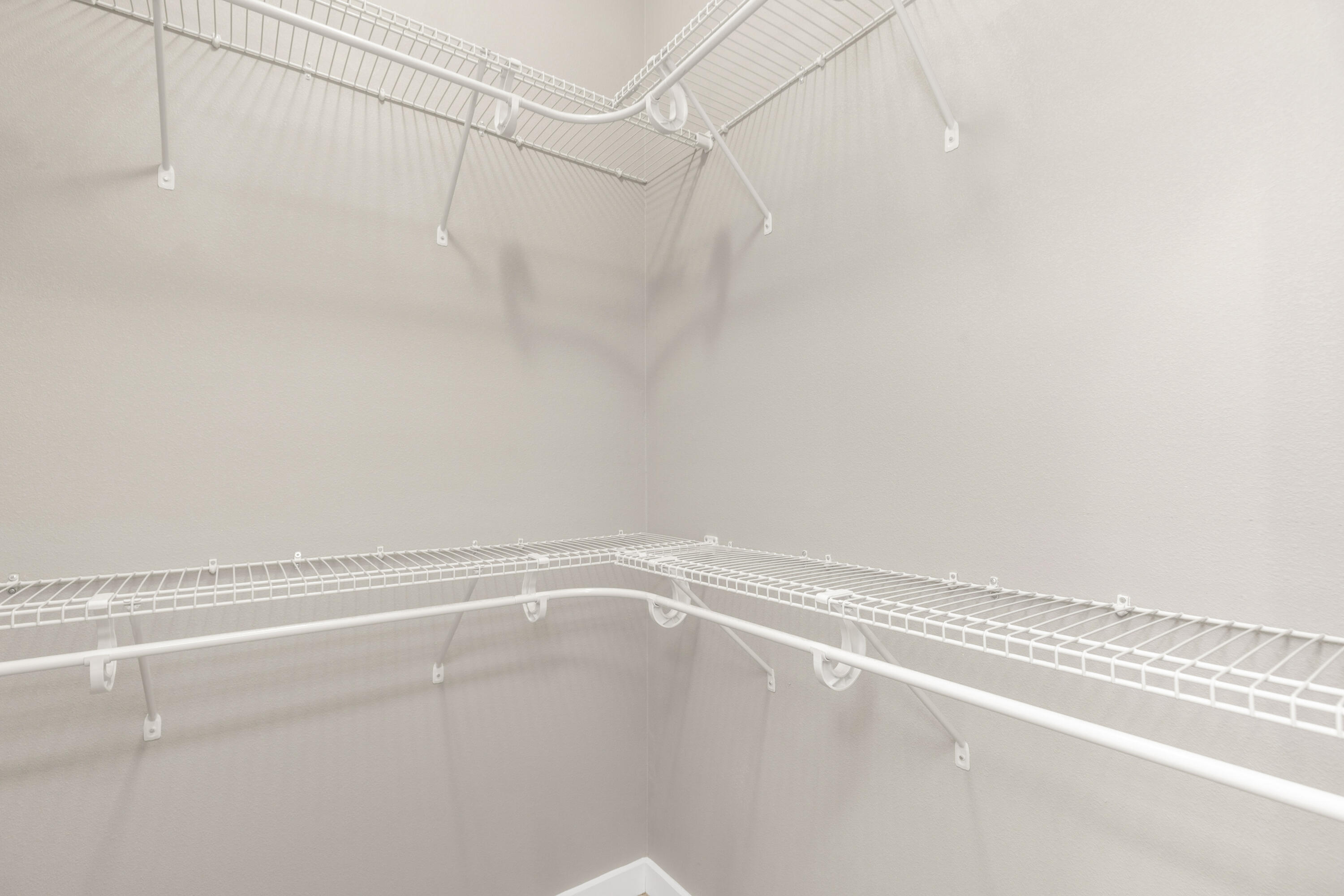 6437 Amanda Court Crestview, FL 32536 - Photo 28 of 48 a view of a room with racks on the wall