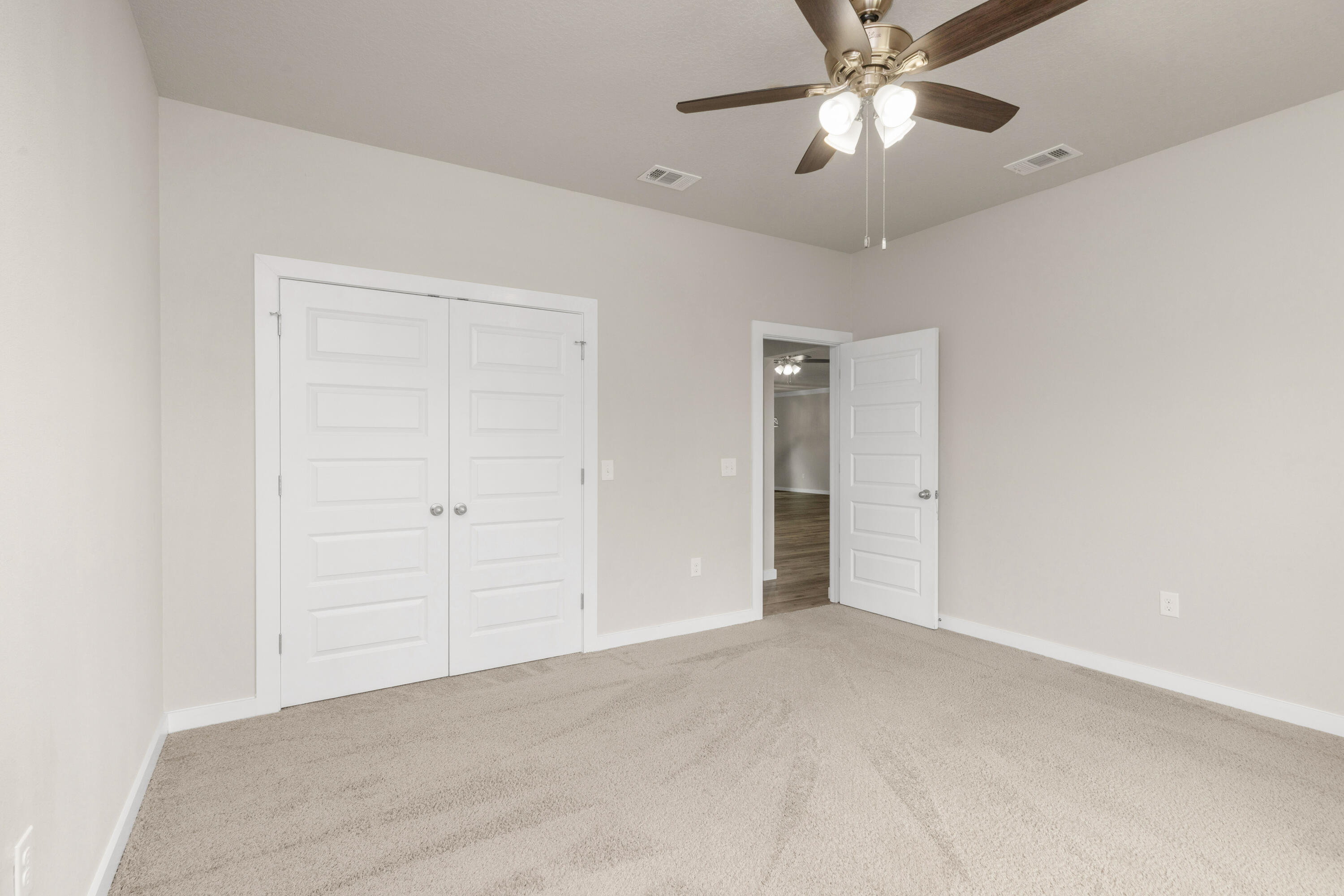 6437 Amanda Court Crestview, FL 32536 - Photo 42 of 48 a view of an empty room and chandelier fan