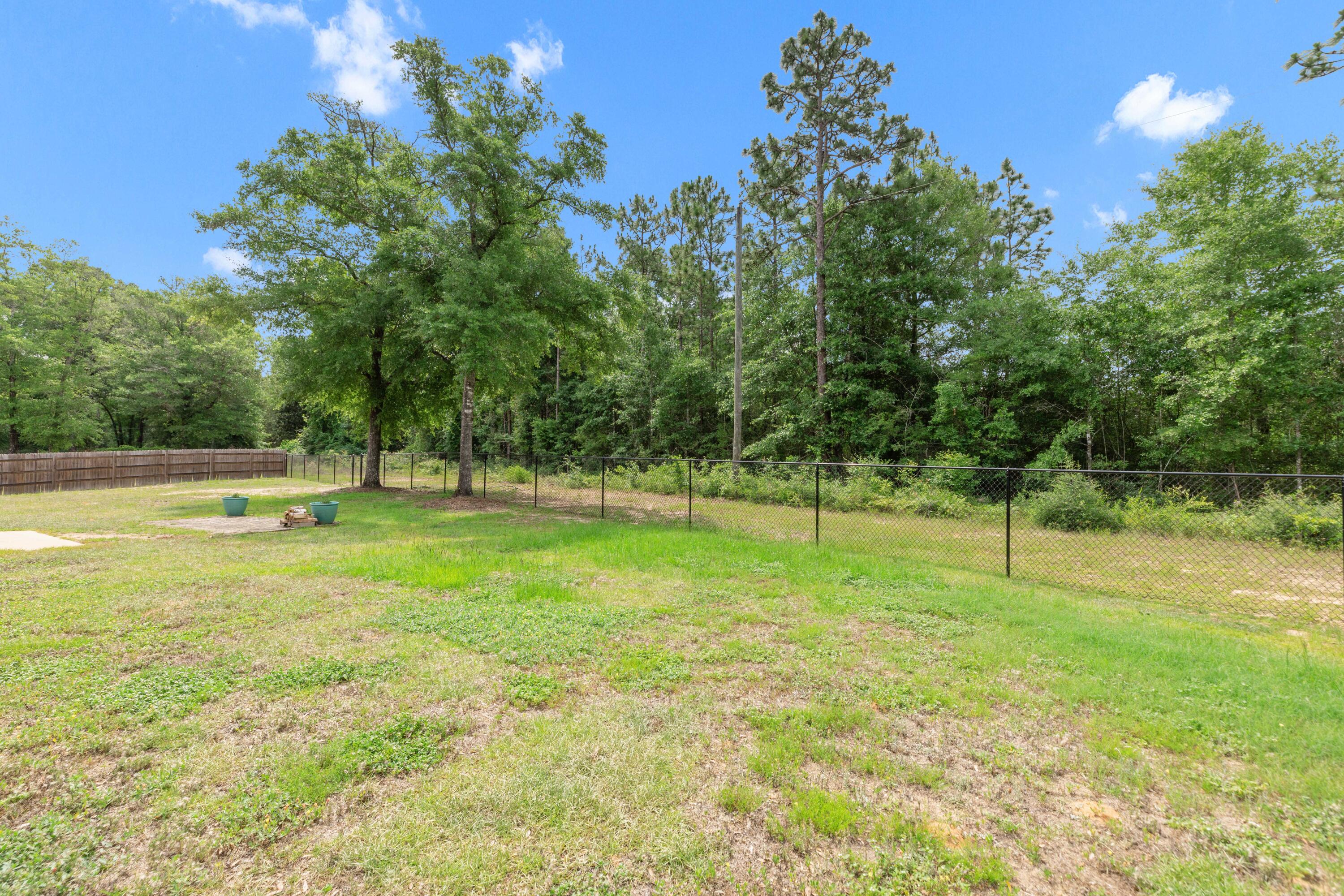 6437 Amanda Court Crestview, FL 32536 - Photo 46 of 48 a view of pool with trees