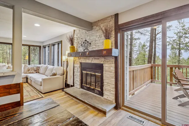 a view of a two chairs on the roof deck