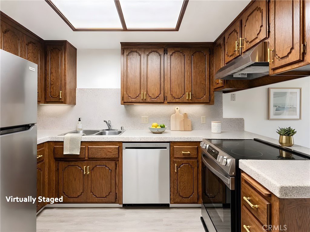 2180 Bellevue Road Atwater, CA 95301 - Photo 12 of 31 a kitchen with stainless steel appliances granite countertop a sink stove and cabinets