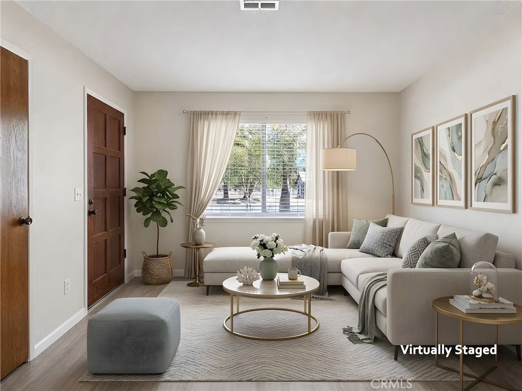 2180 Bellevue Road Atwater, CA 95301 - Photo 6 of 31 a living room with furniture and a large window