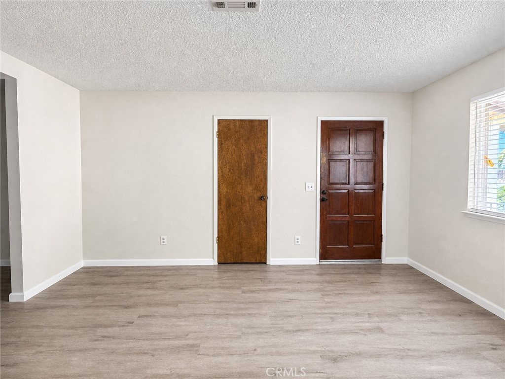 2180 Bellevue Road Atwater, CA 95301 - Photo 8 of 31 wooden floor in an empty room