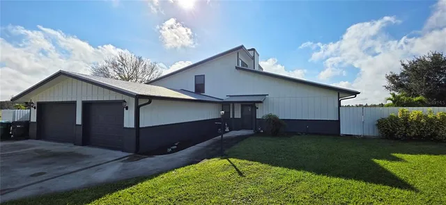 a house view with a garden space