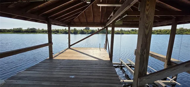 a view of house with backyard