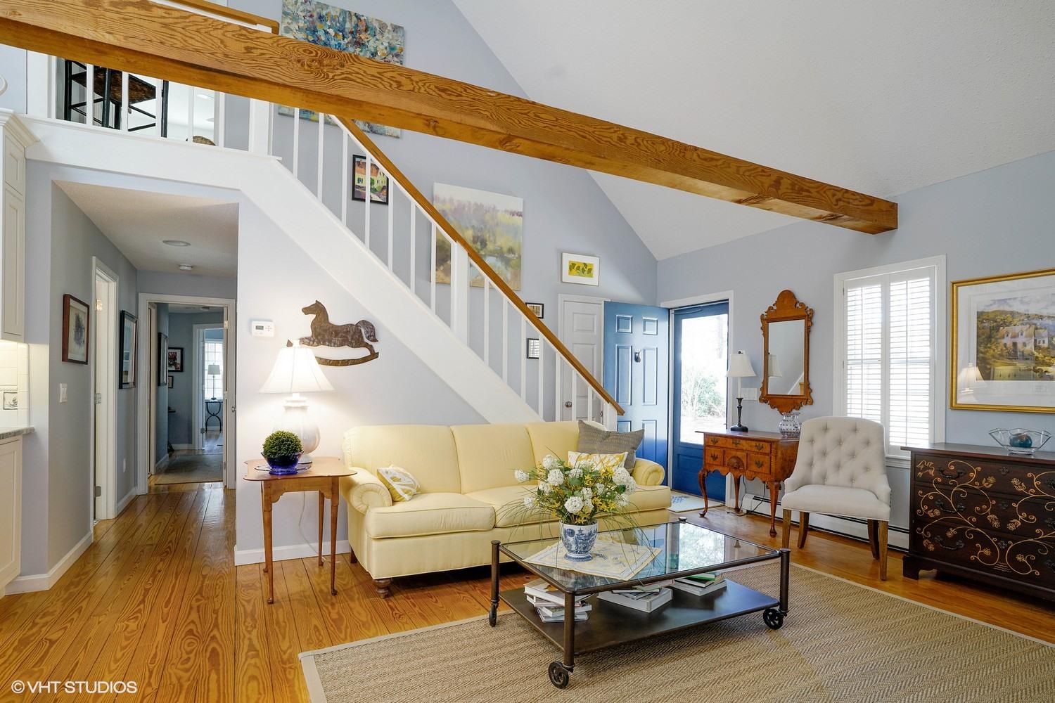 105 Cole Road Eastham, MA 02642 - Photo 15 of 30 a living room with furniture and wooden floor